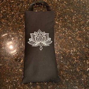 10 lb weighted sandbag for Yin and restorative yoga, black lotus flower